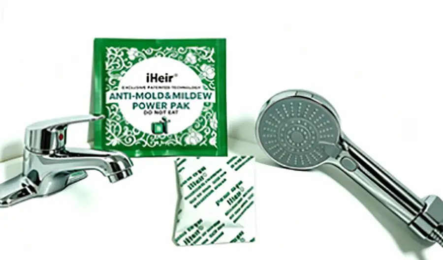 卫浴件包装：水龙头与花洒旁放着 iHeir Power Pak 防霉片，用于装箱阶段的抑菌