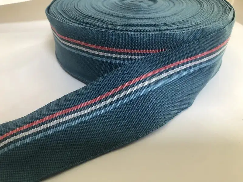 纺织成品：成卷织物按规格盘放，用于后整理后入库与卷装发货