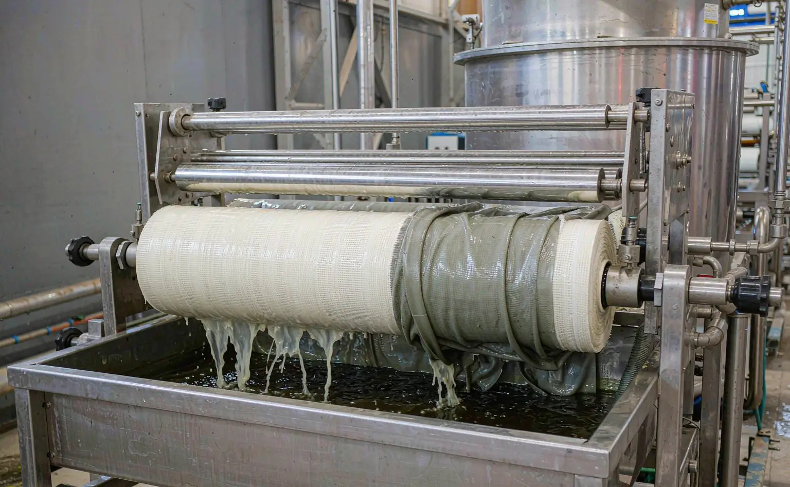 Interior fabric finishing line: seat fabric and headliner cloth padded through the trough and wound on rollers